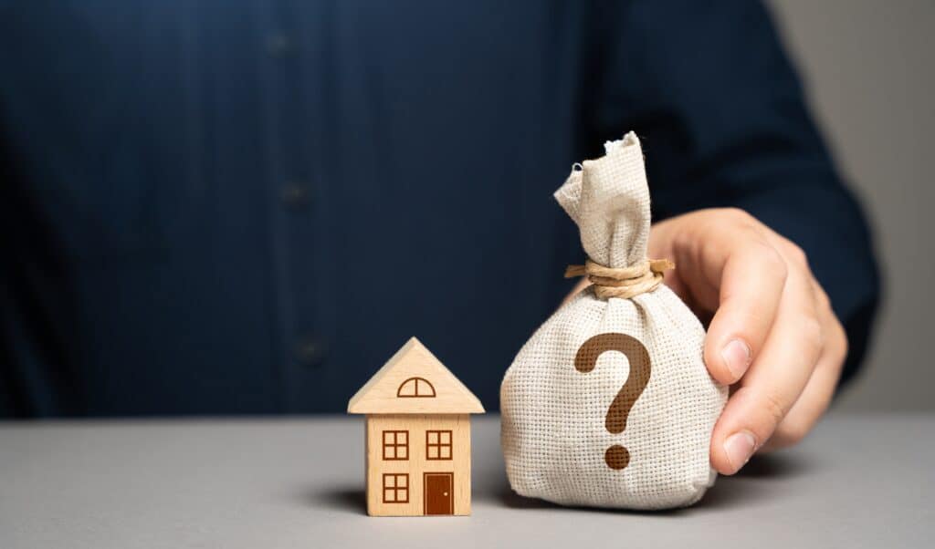 Real estate agent explaining cash offer factors to Philadelphia seller